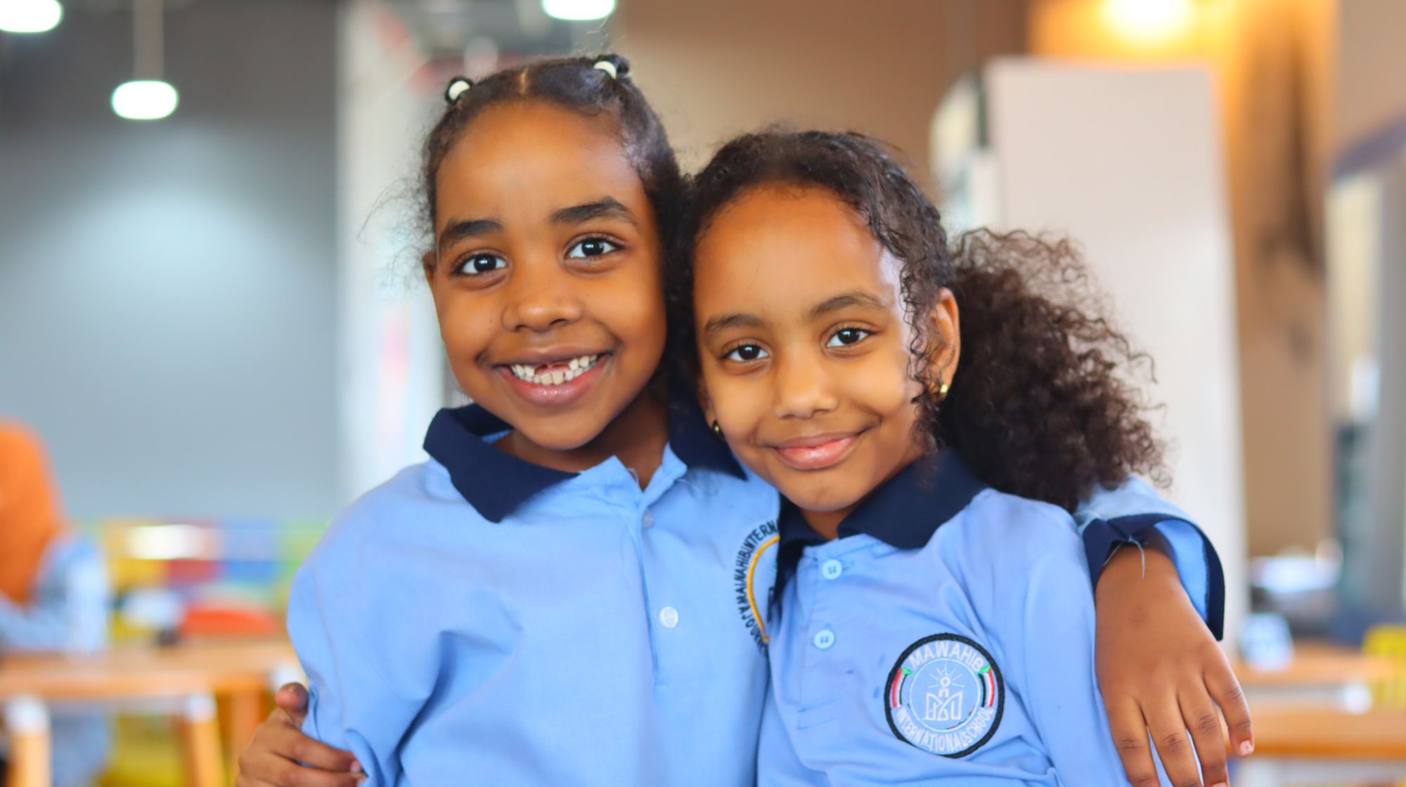 Two Mawahib students smiling together