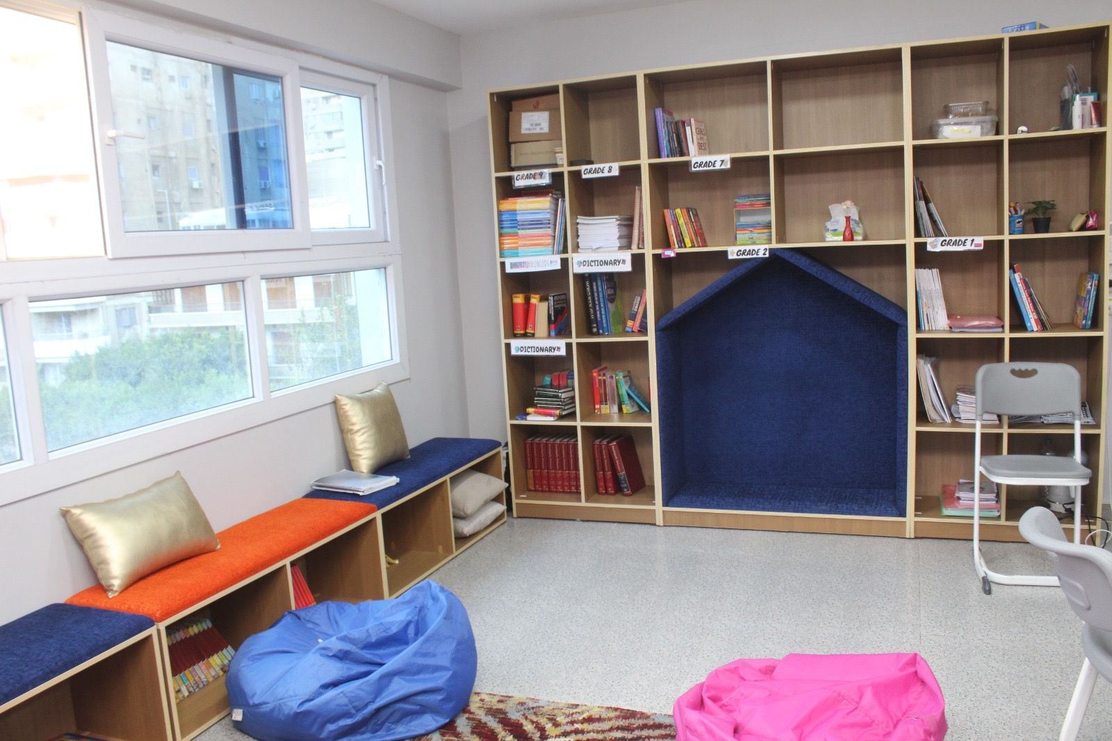 The school library with a reading nook and bean bags